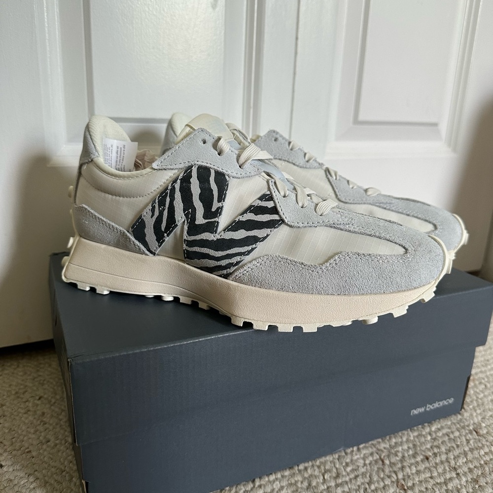 New Balance 327 sneakers in pastel blue and zebra